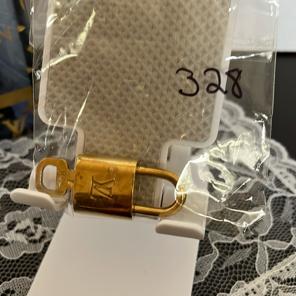 Louis Vuitton Brass Lock. #328